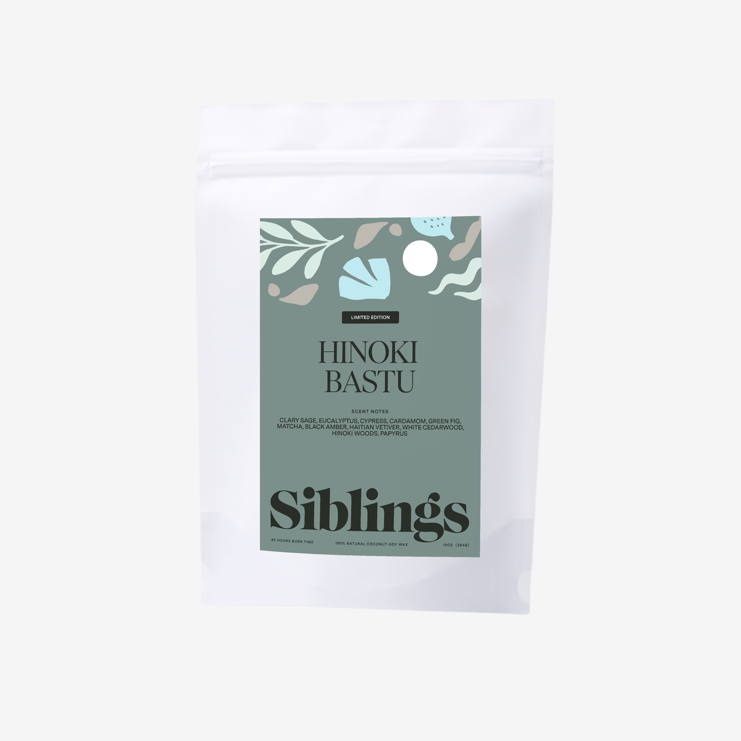 Eco-friendly candle in compostable bag, called 'Hinoki Bastu' with woody and herbal notes
