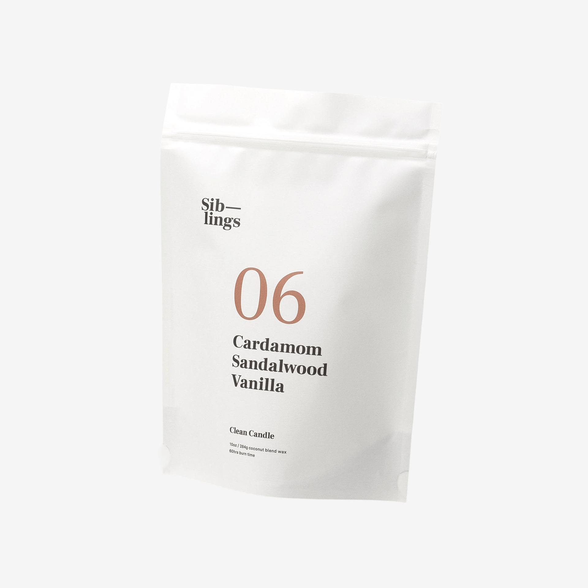 No. 06 — Cardamom, Sandalwood, Vanilla candle refill bag, showing eco-friendly packaging and Siblings branding.