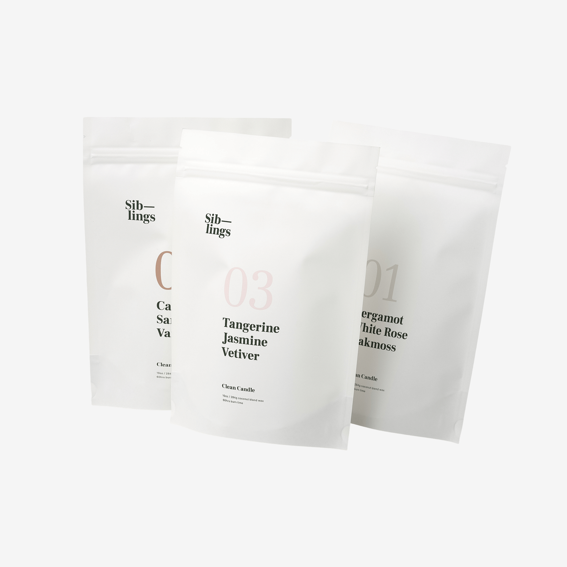 Siblings eco-friendly candle refill Spa Pack in three popular scents: Tangerine Jasmine Vetiver, Bergamot White Rose Oakmoss, and Cardamom Sandalwood Vanilla.