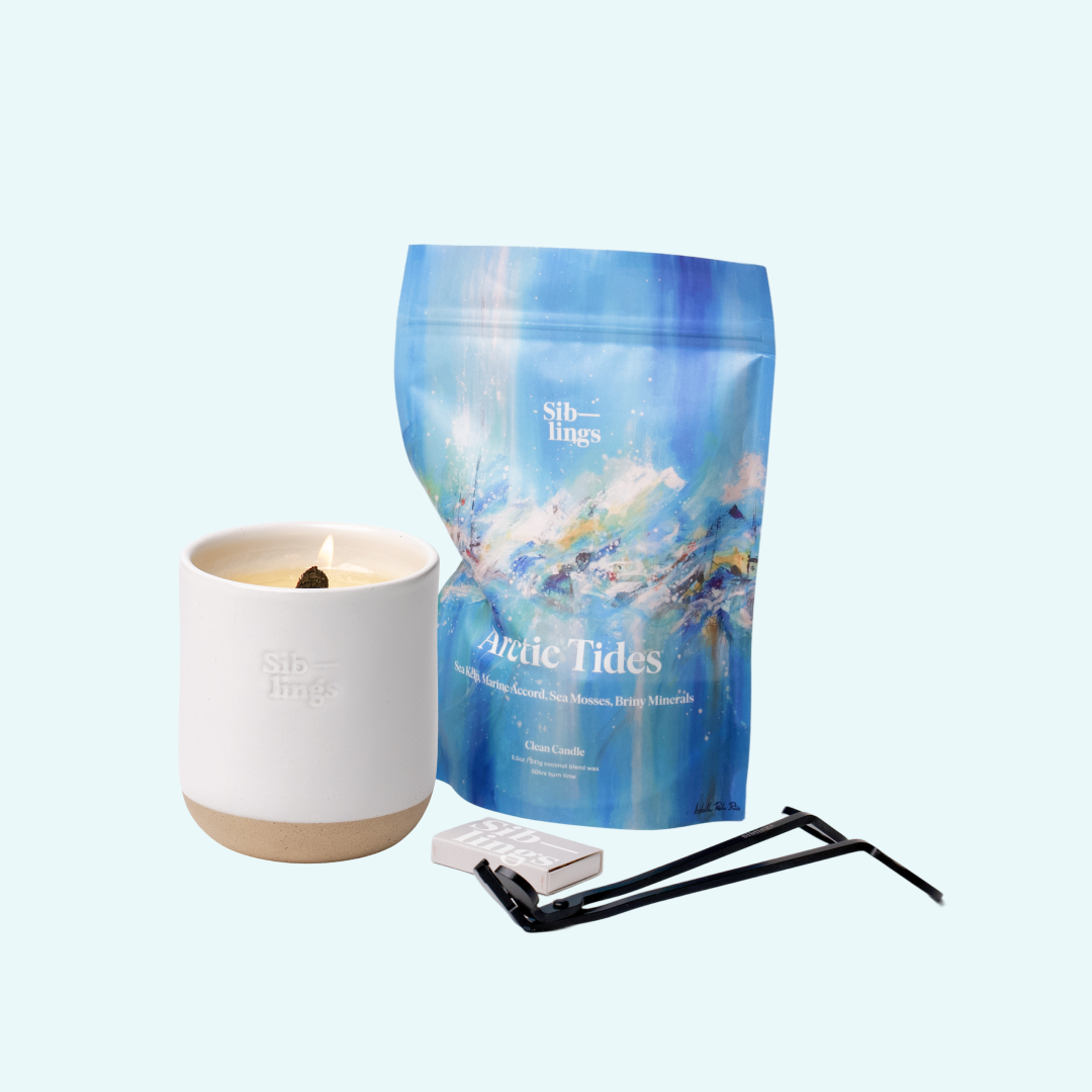 Siblings Arctic Tides candle starter set with White Cloud vessel, compostable wax refill bag, and black wick trimmer, showcasing an eco-friendly refill kit.