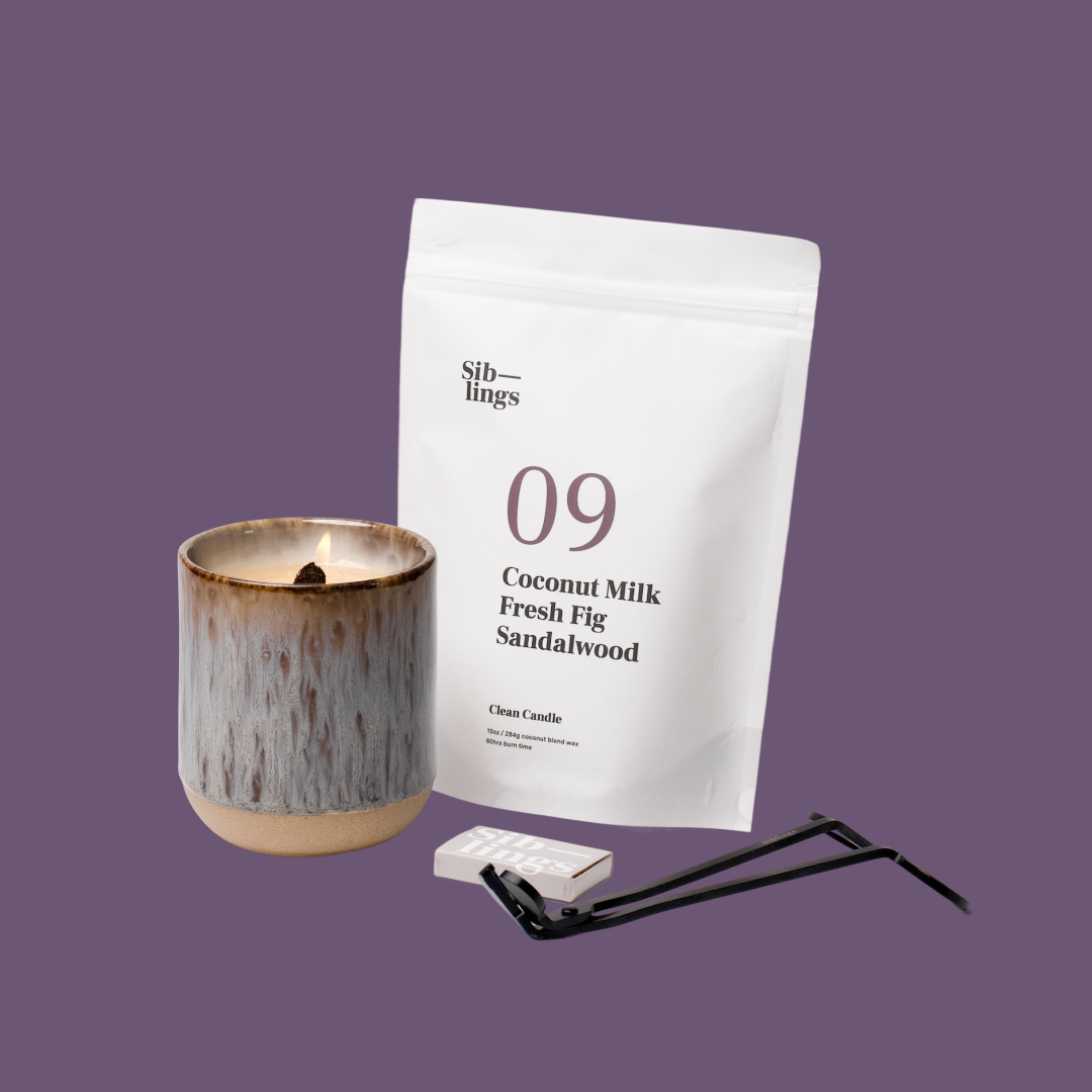 Siblings No. 09 candle starter set with Earth vessel, compostable wax refill bag (Coconut Milk, Fig, Sandalwood ), and black wick trimmer, showcasing an eco-friendly refill kit.