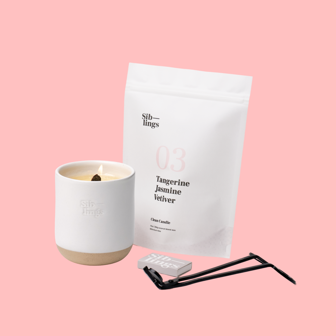 Siblings No. 03 candle starter set with White Cloud vessel, compostable wax refill bag (Tangerine/Jasmine/Vetiver), and black wick trimmer, showcasing an eco-friendly refill kit.