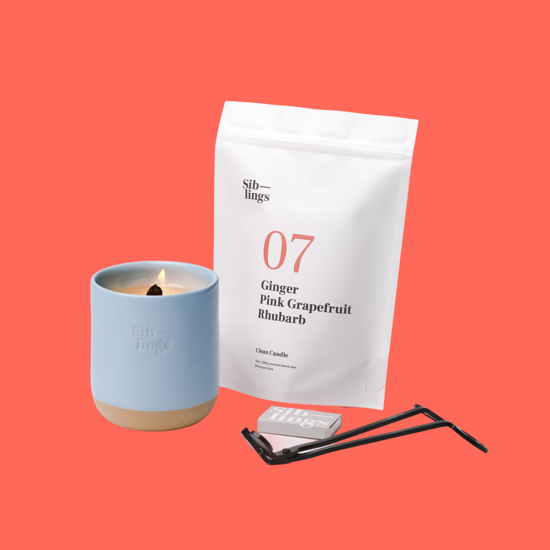 Siblings No. 07 candle starter set with Sky vessel, compostable wax refill bag (Ginger, Pink Grapefruit, Rhubarb ), and black wick trimmer, showcasing an eco-friendly refill kit.